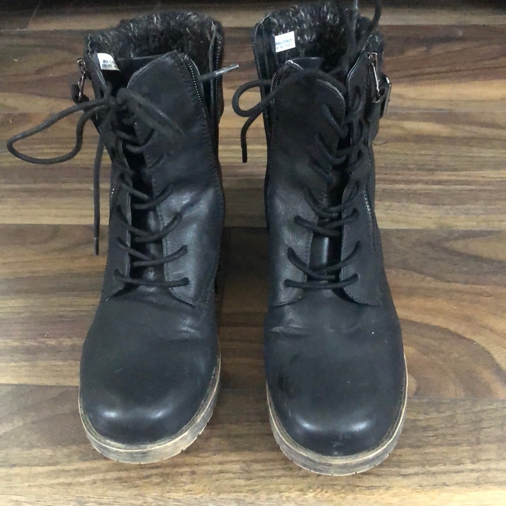 Black combat boots worn a few times. Sole is made to look distressed. Great cond